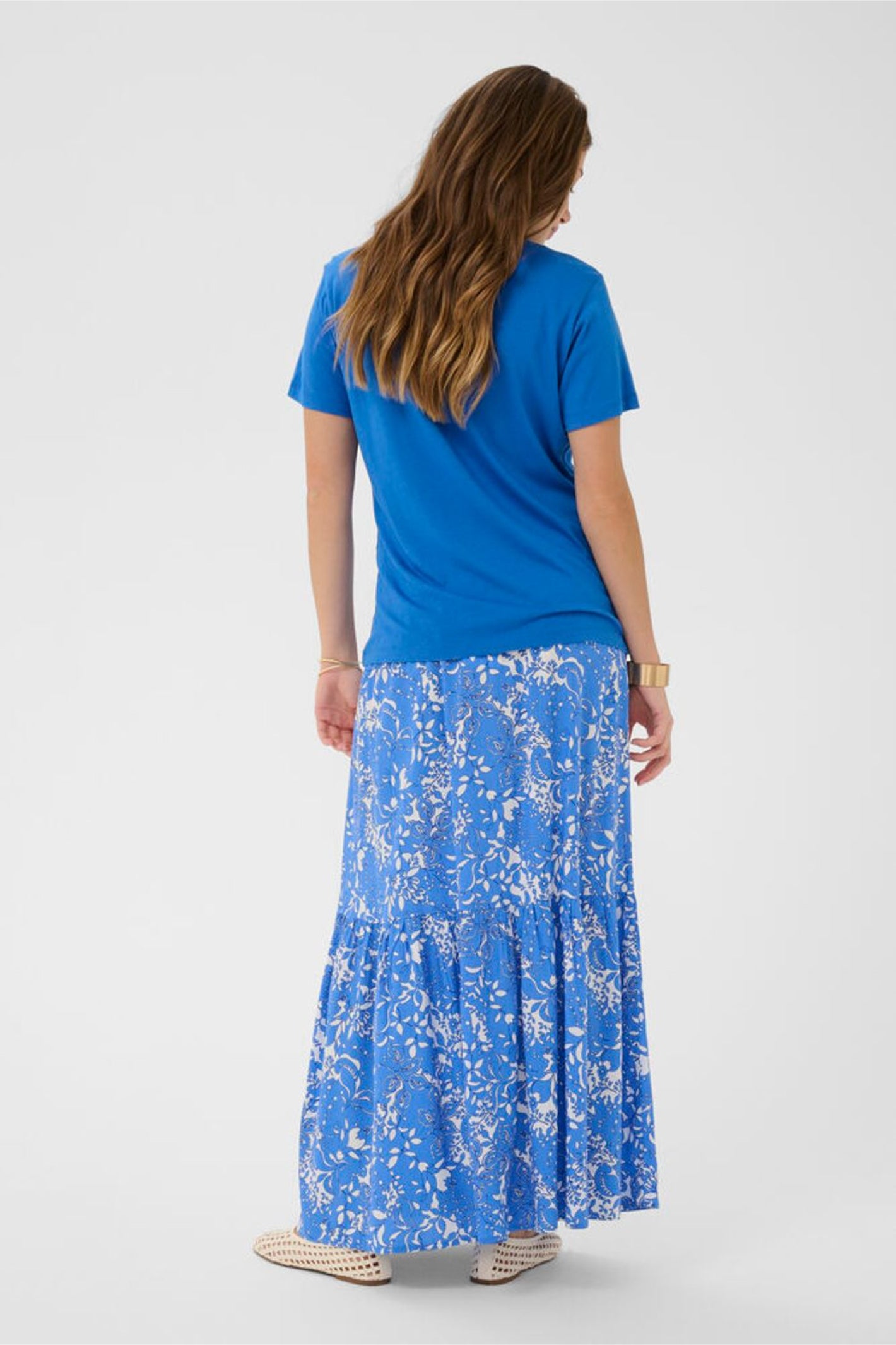 Model seen from behind wearing Cream 10612450 CRNaia Deep V-neck T-shirt Palace Blue by Cream, shop the vendor at Dotique