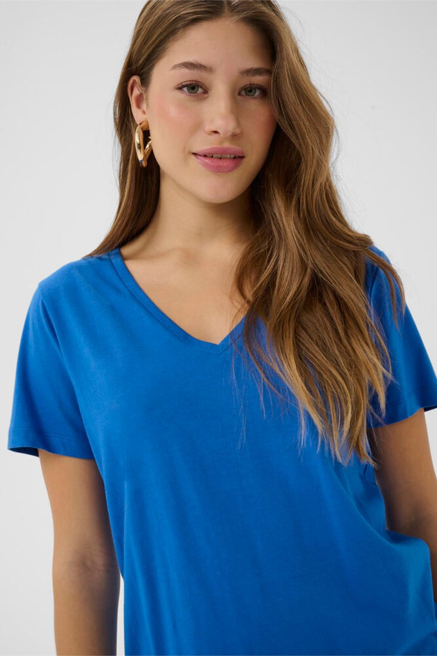 Model wearing Cream 10612450 CRNaia Deep V-neck T-shirt Palace Blue by Cream, shop the vendor at Dotique close-up front view