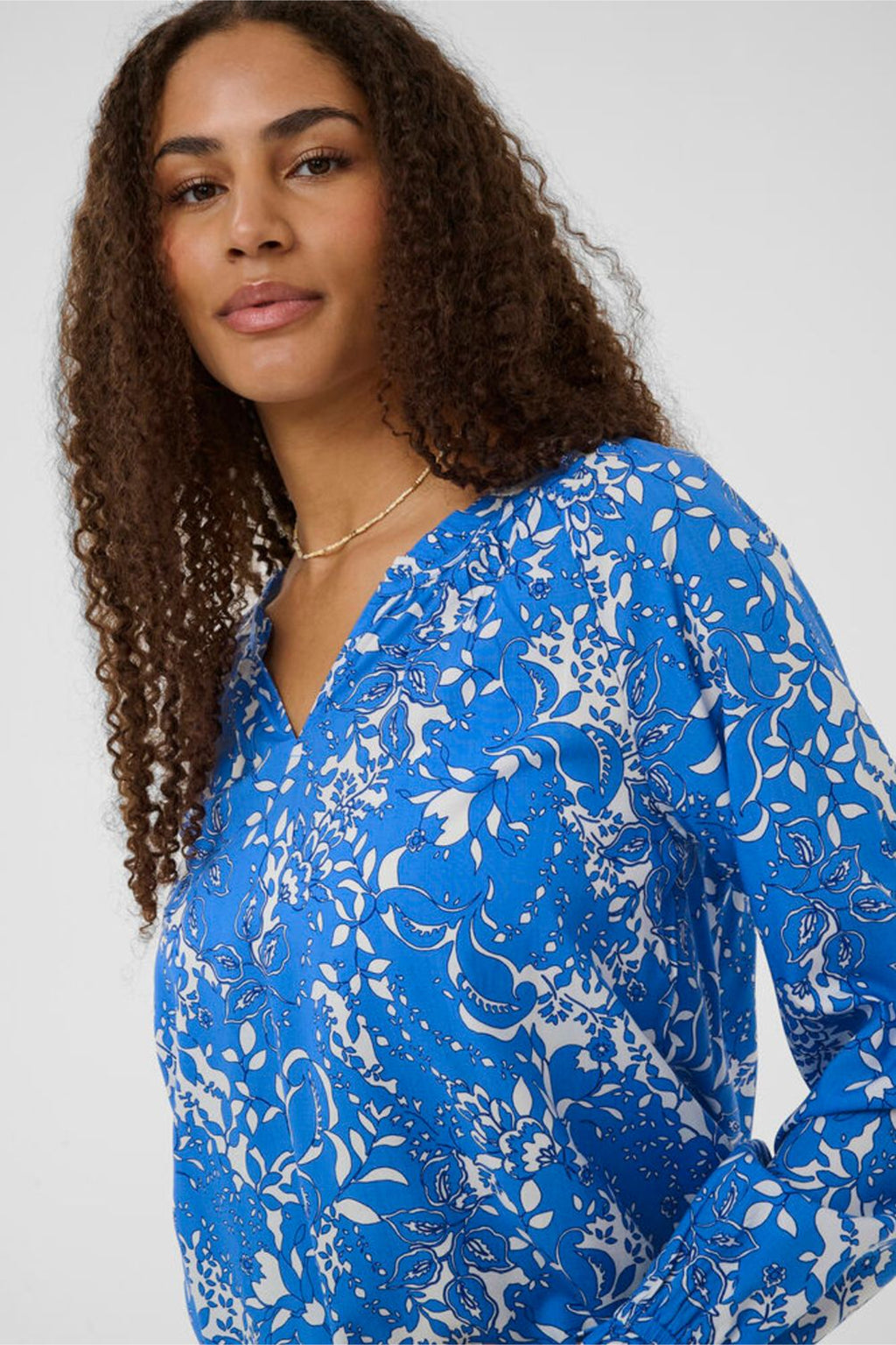Close-up of model wearing Cream 10613577 CRTiah Boho Blouse Blue Toile by Cream, shop the vendor at Dotique front view