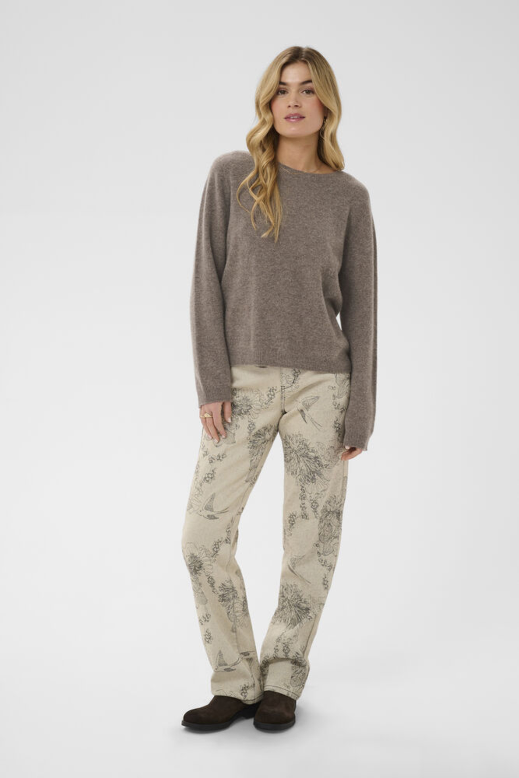 Shop the Cream CRMela Jumper in Java Melange at Dotique. A luxurious 100% wool jumper with a classic crew neck, regular fit and timeless everyday style.