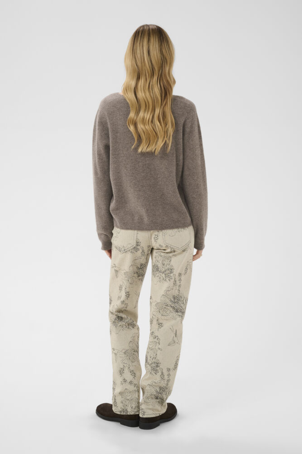 Shop the Cream CRMela Jumper in Java Melange at Dotique. A luxurious 100% wool jumper with a classic crew neck, regular fit and timeless everyday style.