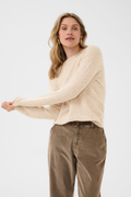 Shop the Cream CRMela Jumper in Oat Melange at Dotique. A luxurious 100% wool jumper with a classic crew neck, regular fit and timeless everyday style.