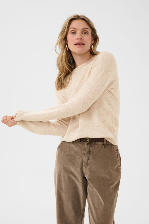 Shop the Cream CRMela Jumper in Oat Melange at Dotique. A luxurious 100% wool jumper with a classic crew neck, regular fit and timeless everyday style.