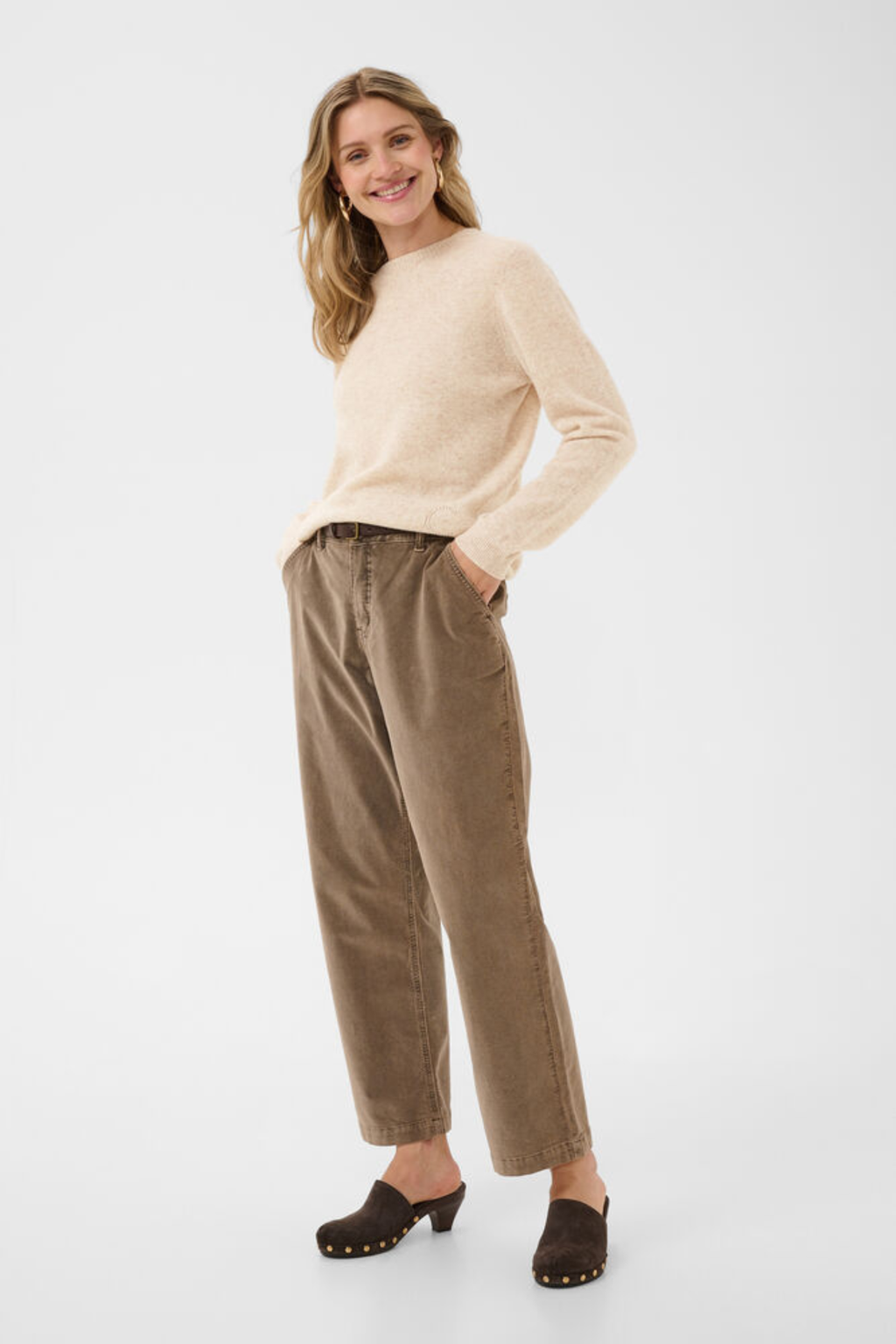 Shop the Cream CRMela Jumper in Oat Melange at Dotique. A luxurious 100% wool jumper with a classic crew neck, regular fit and timeless everyday style.