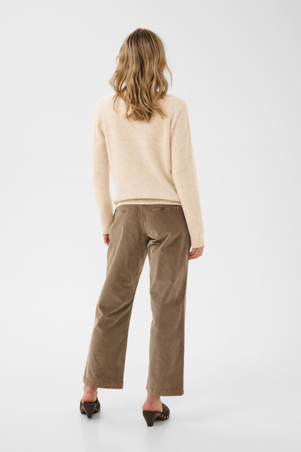 Shop the Cream CRMela Jumper in Oat Melange at Dotique. A luxurious 100% wool jumper with a classic crew neck, regular fit and timeless everyday style.