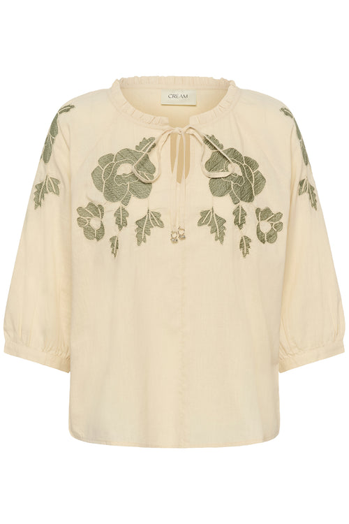 Cream CRZosa embroidered cotton blouse in Bleached Sand with floral embroidery, tie neckline and three-quarter sleeves.