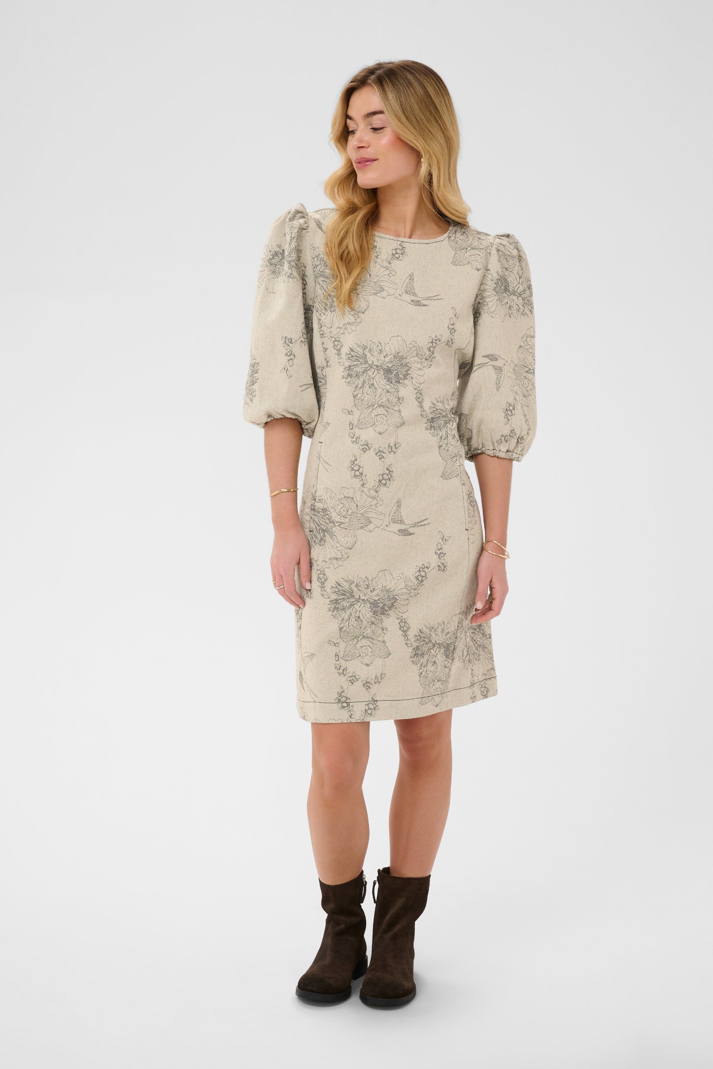 Cream CRVatta fitted jacquard dress in Ecru Flower featuring a textured floral and bird pattern with three-quarter puff sleeves.