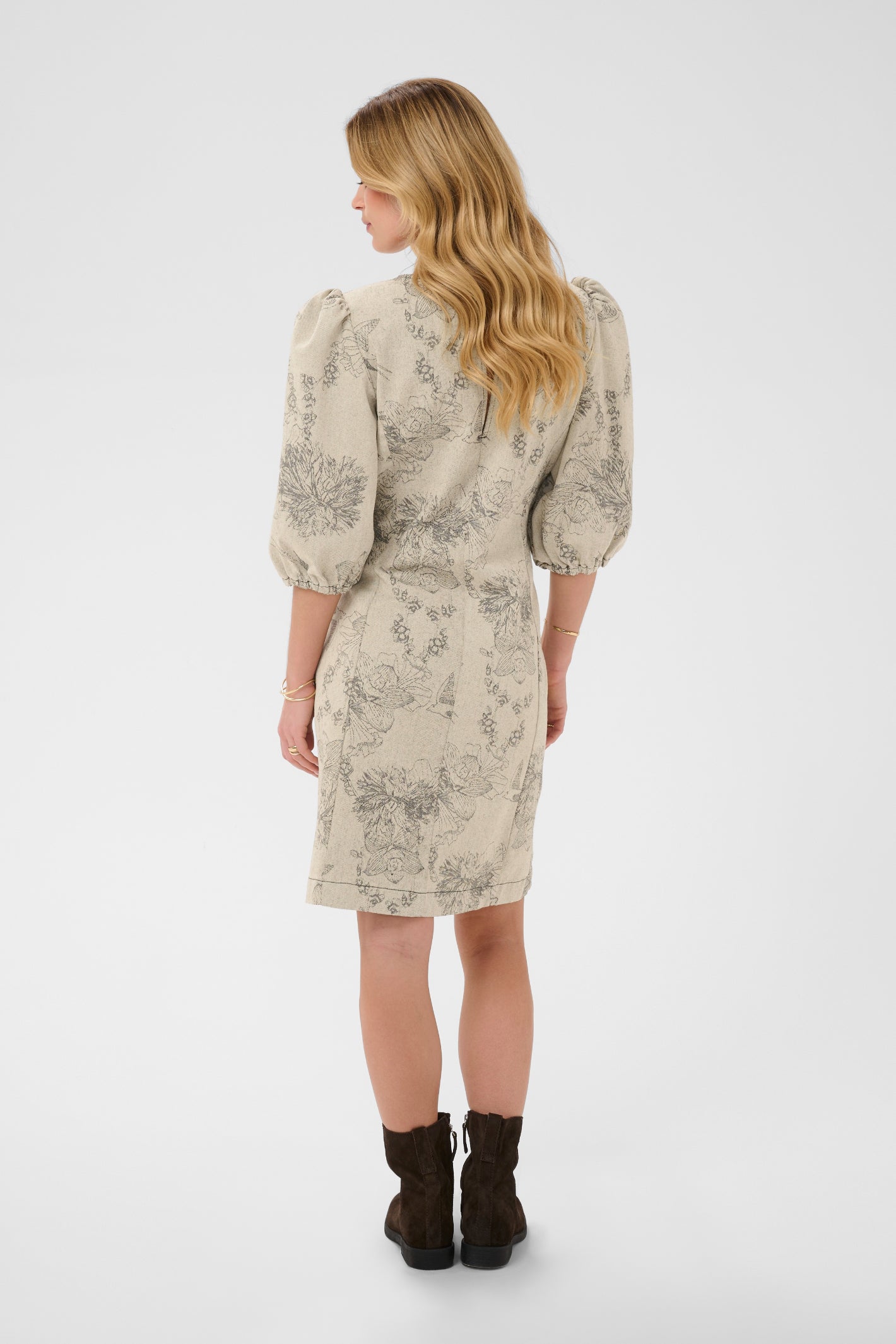 Cream CRVatta fitted jacquard dress in Ecru Flower featuring a textured floral and bird pattern with three-quarter puff sleeves.