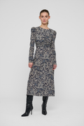 Shop the Dea Kudibal ClaudiaDEA Dress in Dentelle Midnight at Dotique. A luxurious stretch silk midi dress with a flattering ruched waist and floral print.