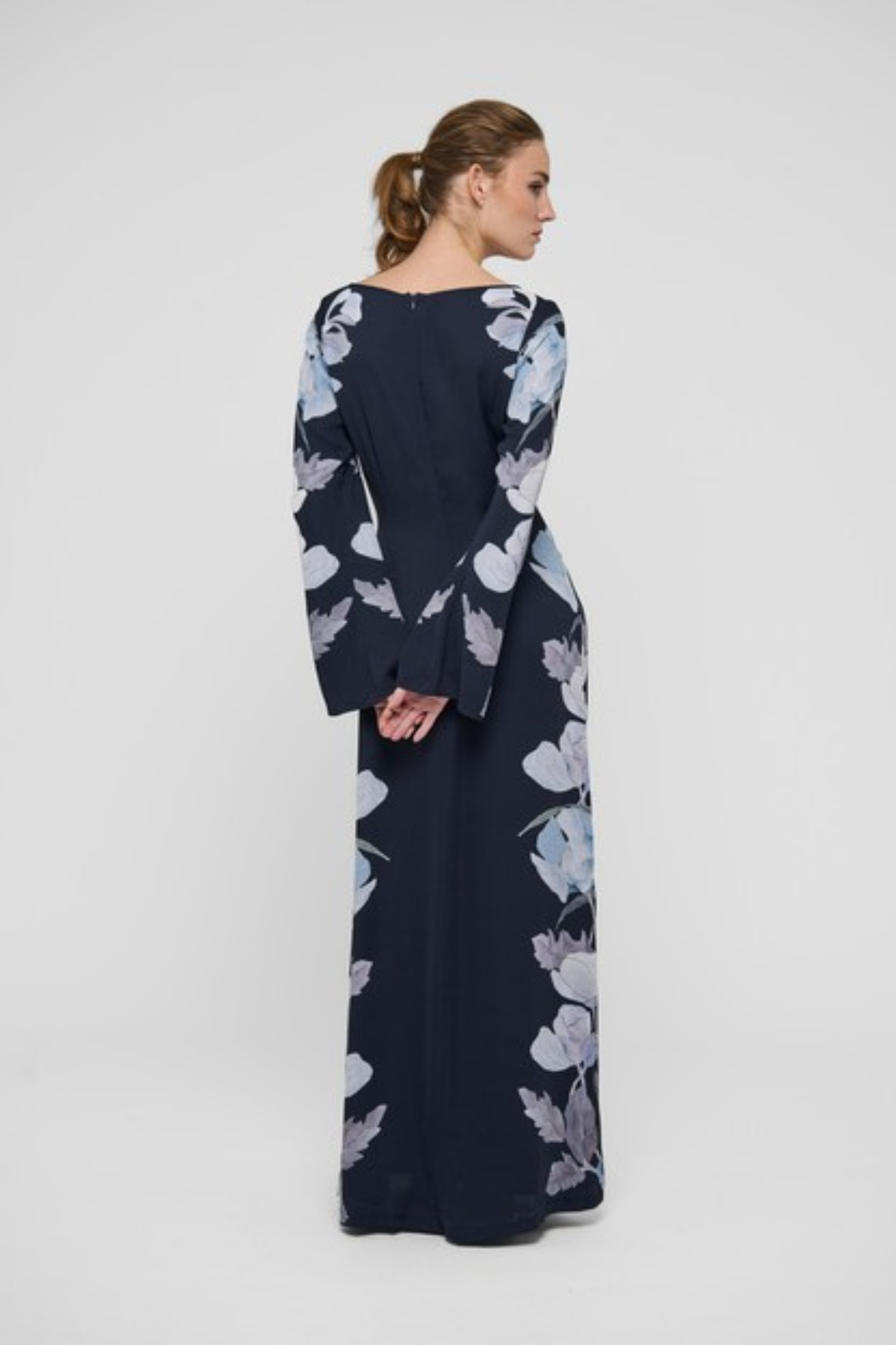 Shop the Dea Kudibal NicoleDEA Dress in Reverie Midnight at Dotique. A full-length printed viscose dress with a boat neckline and slim silhouette.