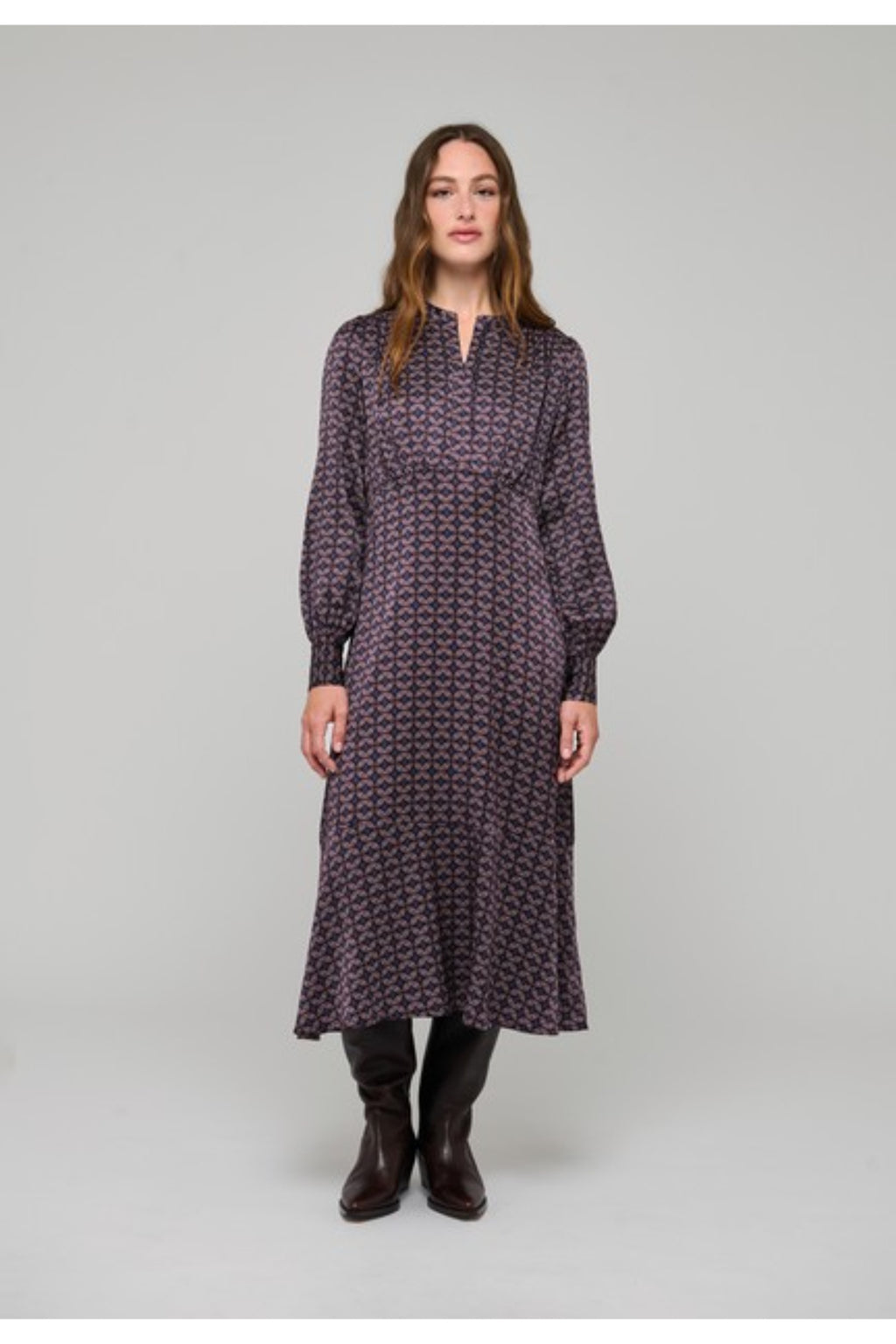 Shop the Dea Kudibal RudyDEA Dress in Eclipse Moonlight at Dotique. A luxurious stretch silk twill midi dress with long sleeves and high cuffs.