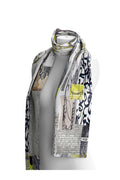 Dotique Dolcezza 76912 assorted woven scarf with an abstract patchwork print in grey, black, white and lime.