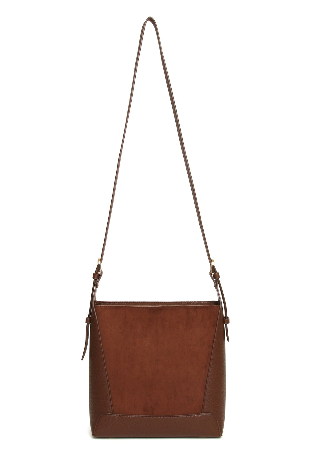 View with the strap extended of the Alice Wheeler Kensington Suedette Crossbody Bag in Chocolate. Shop Alice Wheeler at Dotique.