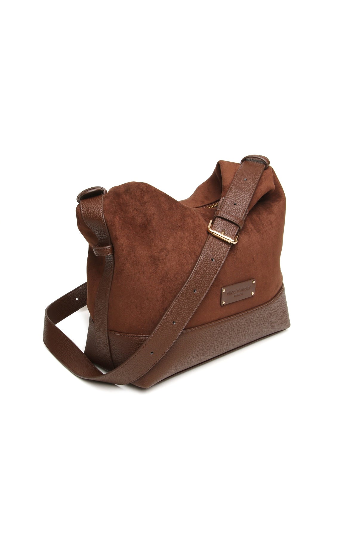 Angled view of the Alice Wheeler Kensington Suedette Large Crossbody Bag in Chocolate. Shop Alice Wheeler at Dotique.