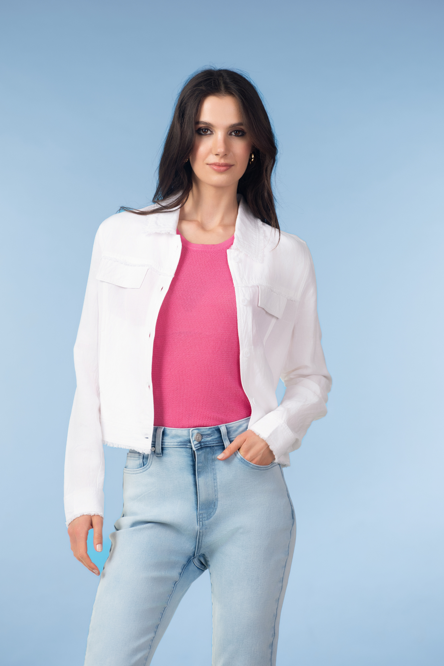 Alison Sheri A47155 White Linen Blend Lightweight Jacket styled with pink top and jeans on model Shop Alison Sheri at Dotique