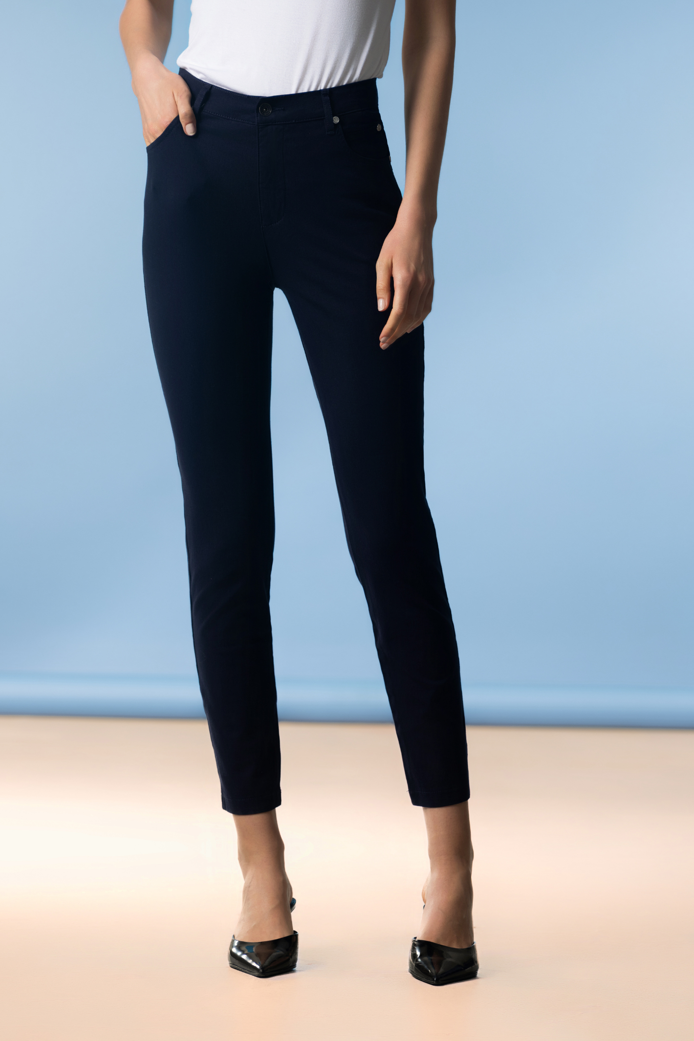 The Alison Sheri PAS2400 trousers in navy are a timeless wardrobe staple, offering a clean, streamlined shape with everyday comfort. Shop Alison Sheri at Dotique.