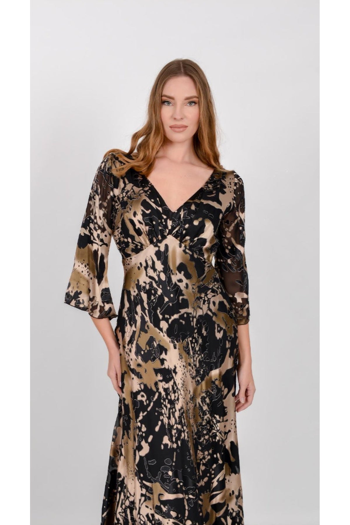 Allison 61197 black and gold silk maxi dress – view 2. Shop Allison at Dotique.