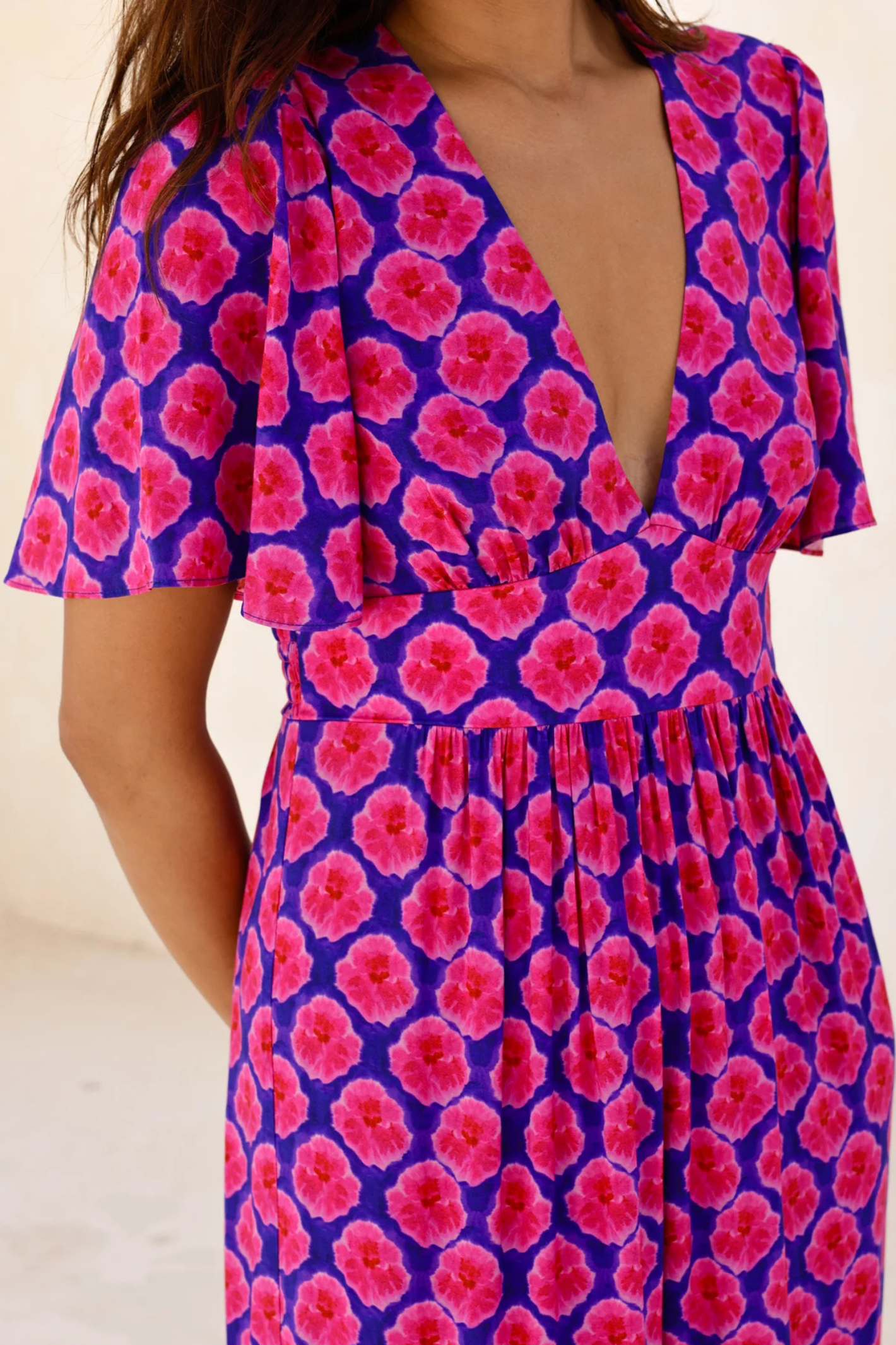 Aspiga Sylvie EcoVero Midaxi Dress Bloom Blue Pink by aspiga with deep V-neck and floral design Shop aspiga at Dotique
