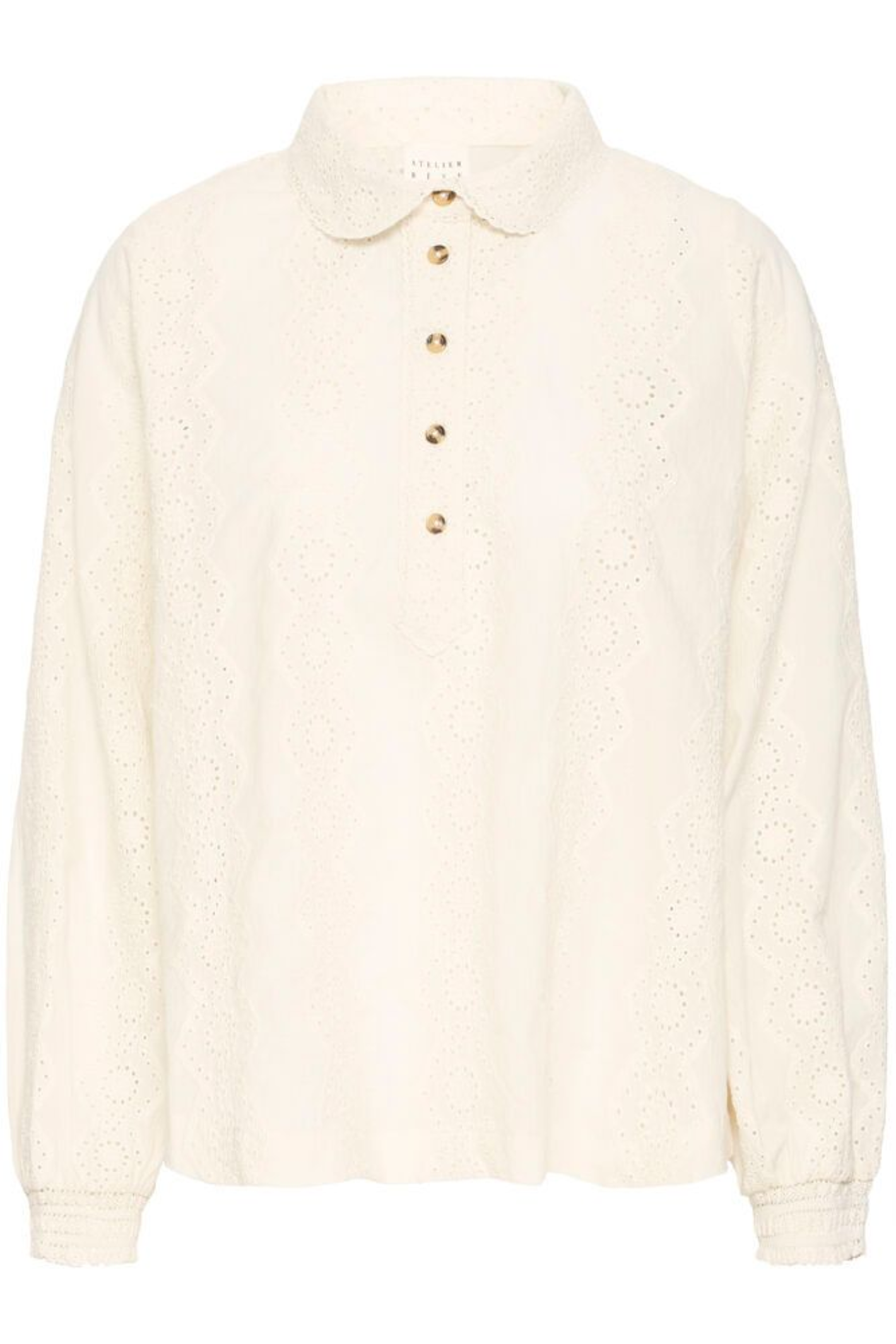 Relaxed cotton shirt by Atelier Rêve in a classic birch shade. Loose fit, long sleeves and easy everyday style. Shop at Dotique.