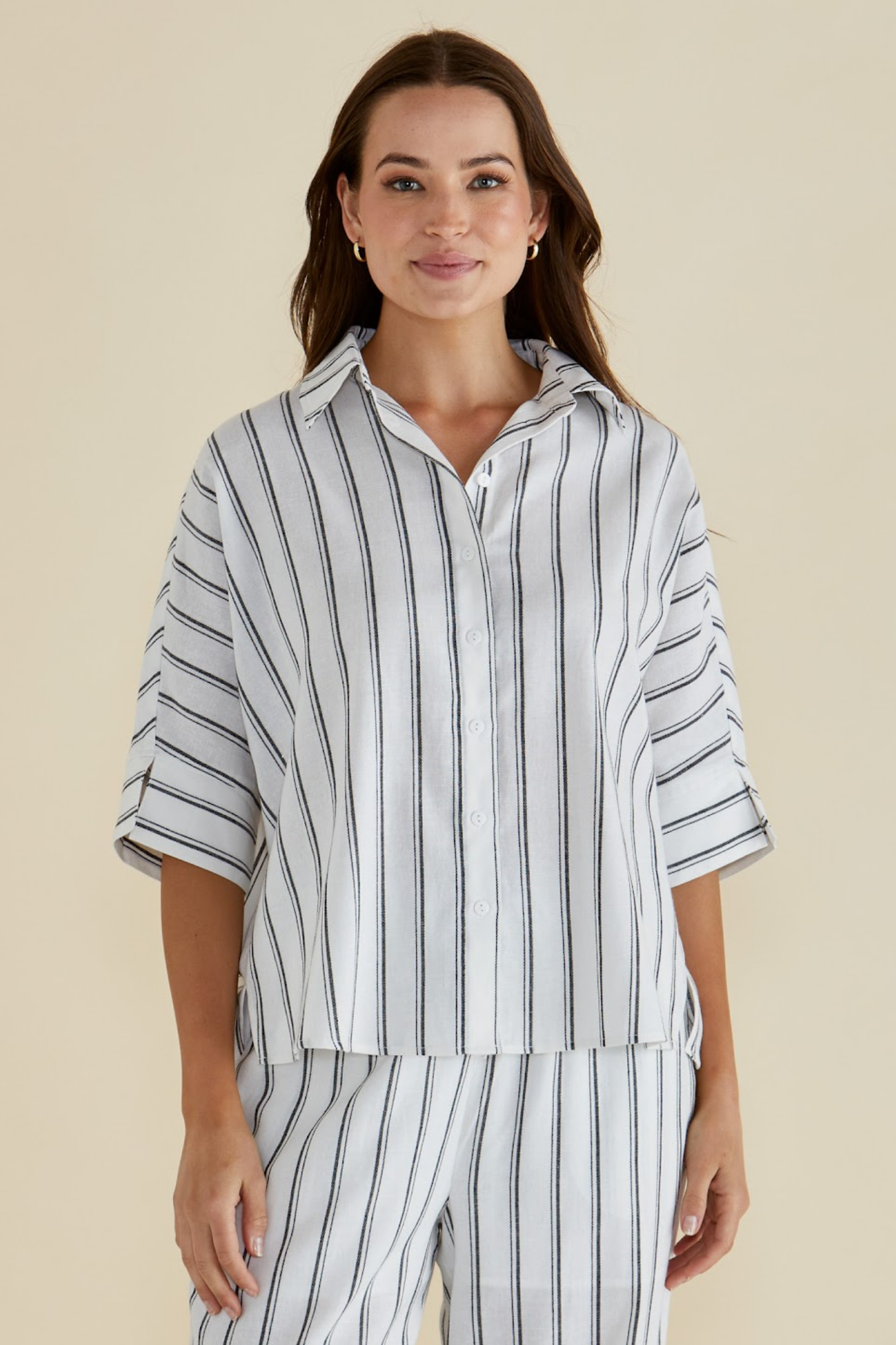 Woman wearing Betty Basics BB8435 Black/White Stripe Lynwood Linen Shirt by Betty Basics Shop Betty Basics at Dotique