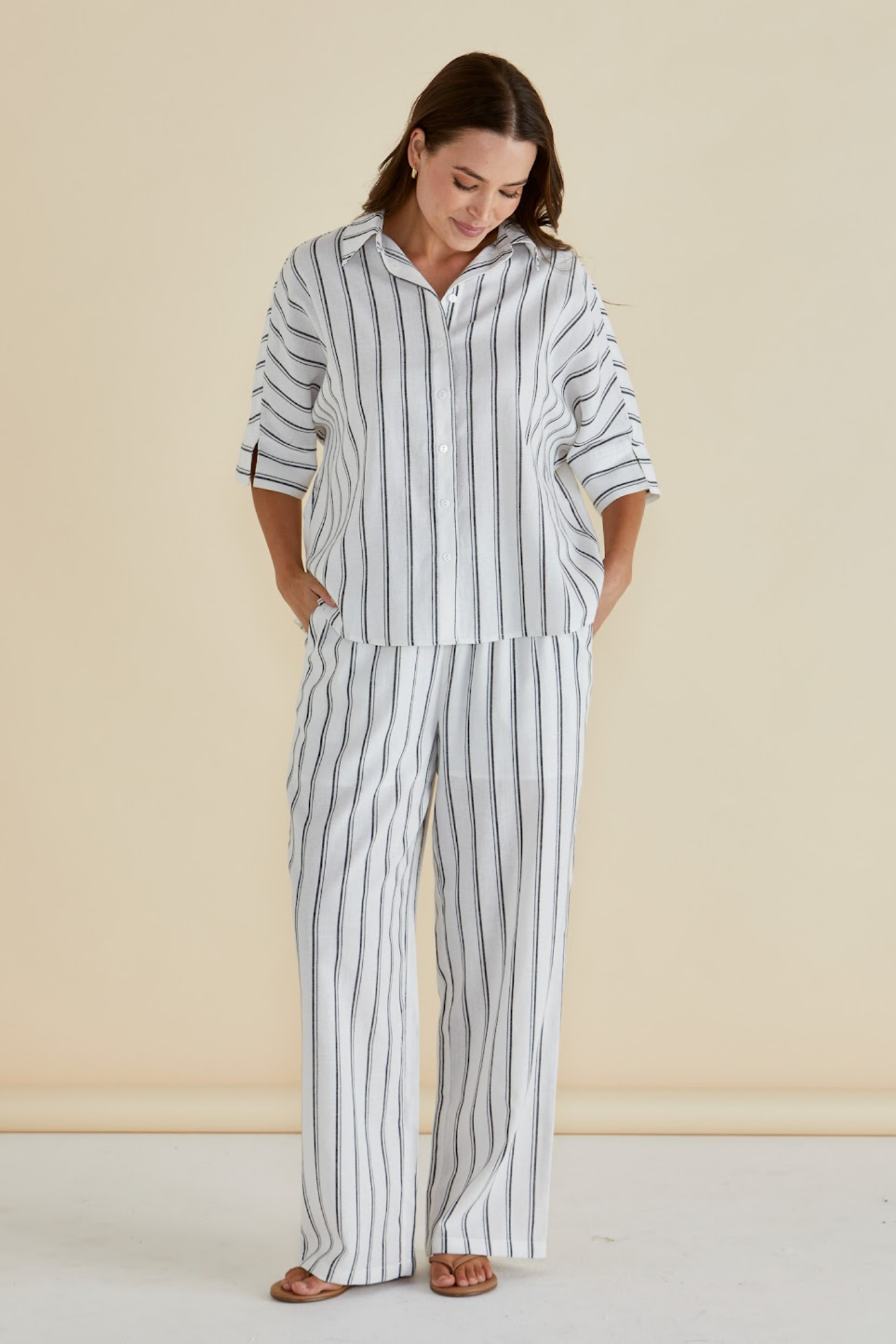 Woman wearing Betty Basics BB8435 Black/White Stripe Lynwood Linen Shirt by Betty Basics, shop Betty Basics at Dotique