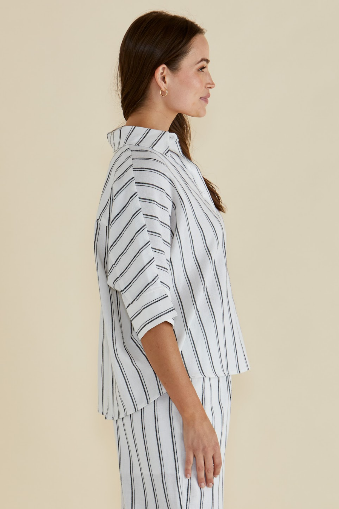 Woman wearing Betty Basics BB8435 Black/White Stripe Lynwood Linen Shirt by Betty Basics Shop Betty Basics at Dotique.