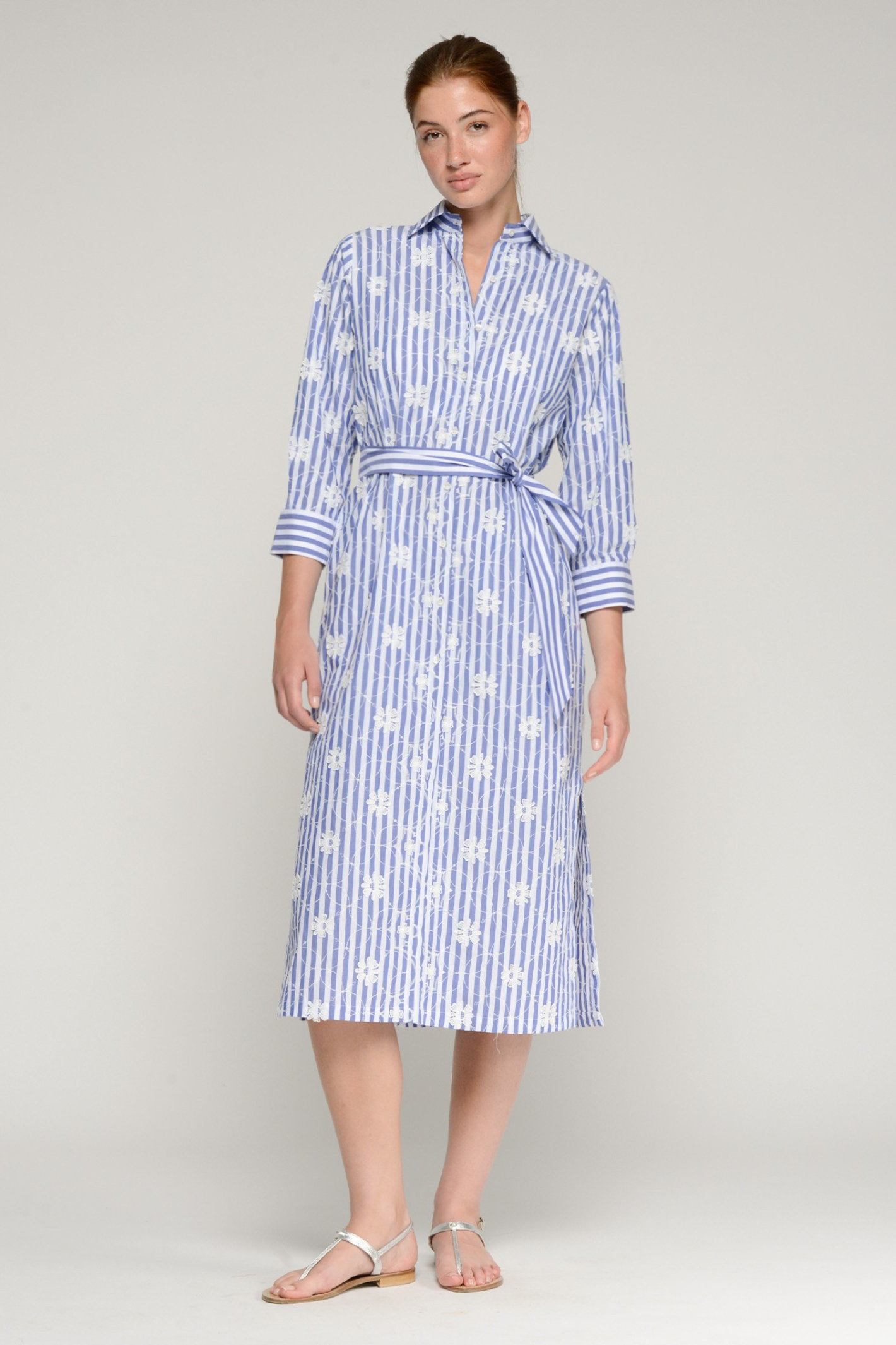 Model wearing Vilagallo 33359 Blue Striped Shirt Dress with White Floral Print by Vilagallo Shop Vilagallo at Dotique