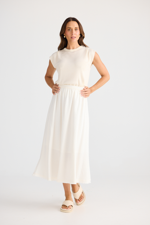 Brave + True Oakley Skirt in off white. Bias-cut midi skirt with elasticated waist, side splits and linen viscose fabric. Shop at Dotique.