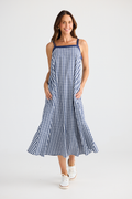 Brave + True Erica Dress in navy gingham. Cotton midi dress with shoulder straps, back tie detail and relaxed fit. Shop Brave + True at Dotique.