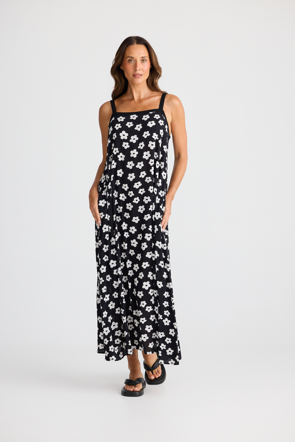 Brave + True Erica Dress in ditsy daisy. Viscose midi dress with shoulder straps, back tie detail and relaxed fit. Shop Brave + True at Dotique.