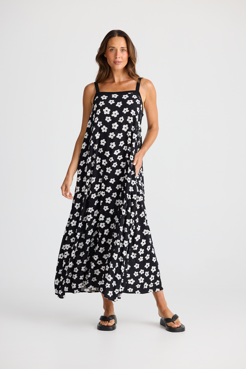 Brave + True Erica Dress in ditsy daisy. Viscose midi dress with shoulder straps, back tie detail and relaxed fit. Shop Brave + True at Dotique.