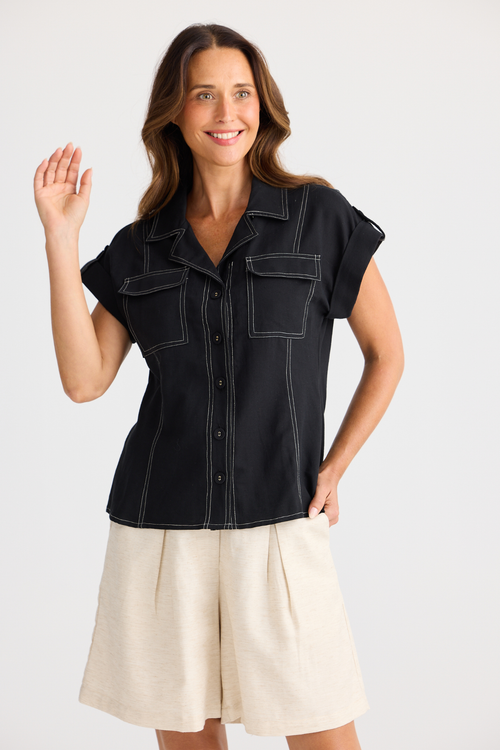 Brave + True Portia Shirt in black. Relaxed fit shirt with open collar, chest pockets and cotton linen TENCEL™ blend. Shop at Dotique.