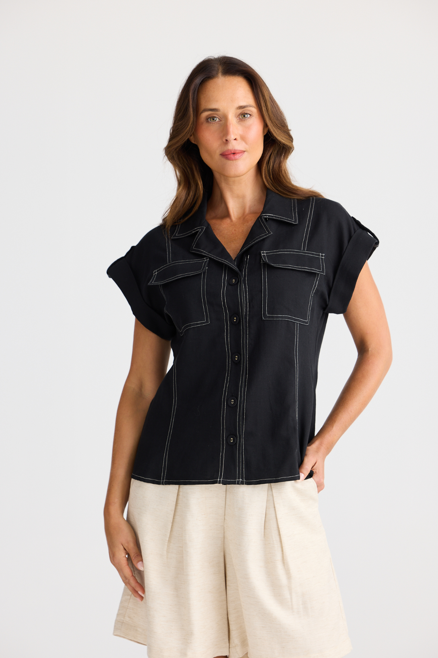Brave + True Portia Shirt in black. Relaxed fit shirt with open collar, chest pockets and cotton linen TENCEL™ blend. Shop at Dotique.