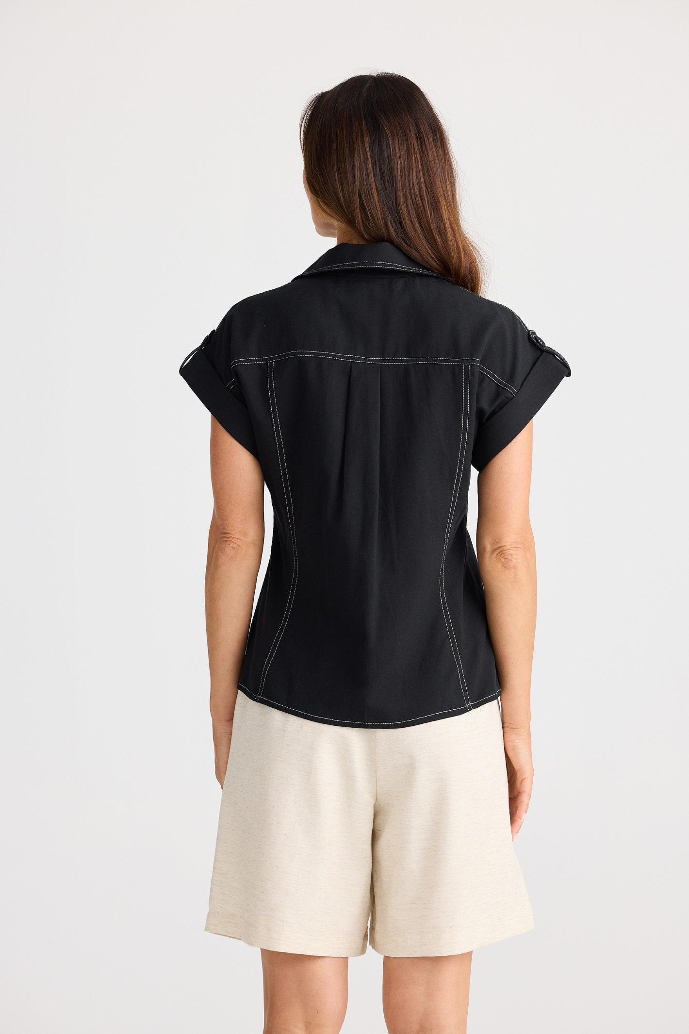 Brave + True Portia Shirt in black. Relaxed fit shirt with open collar, chest pockets and cotton linen TENCEL™ blend. Shop at Dotique.