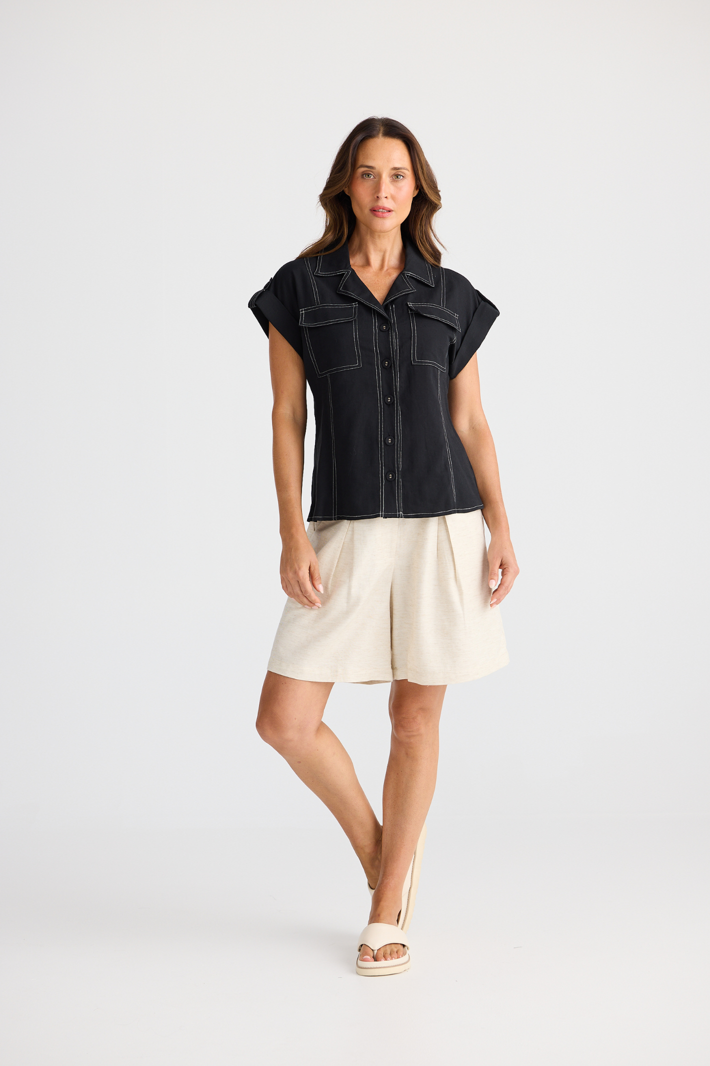 Brave + True Portia Shirt in black. Relaxed fit shirt with open collar, chest pockets and cotton linen TENCEL™ blend. Shop at Dotique.
