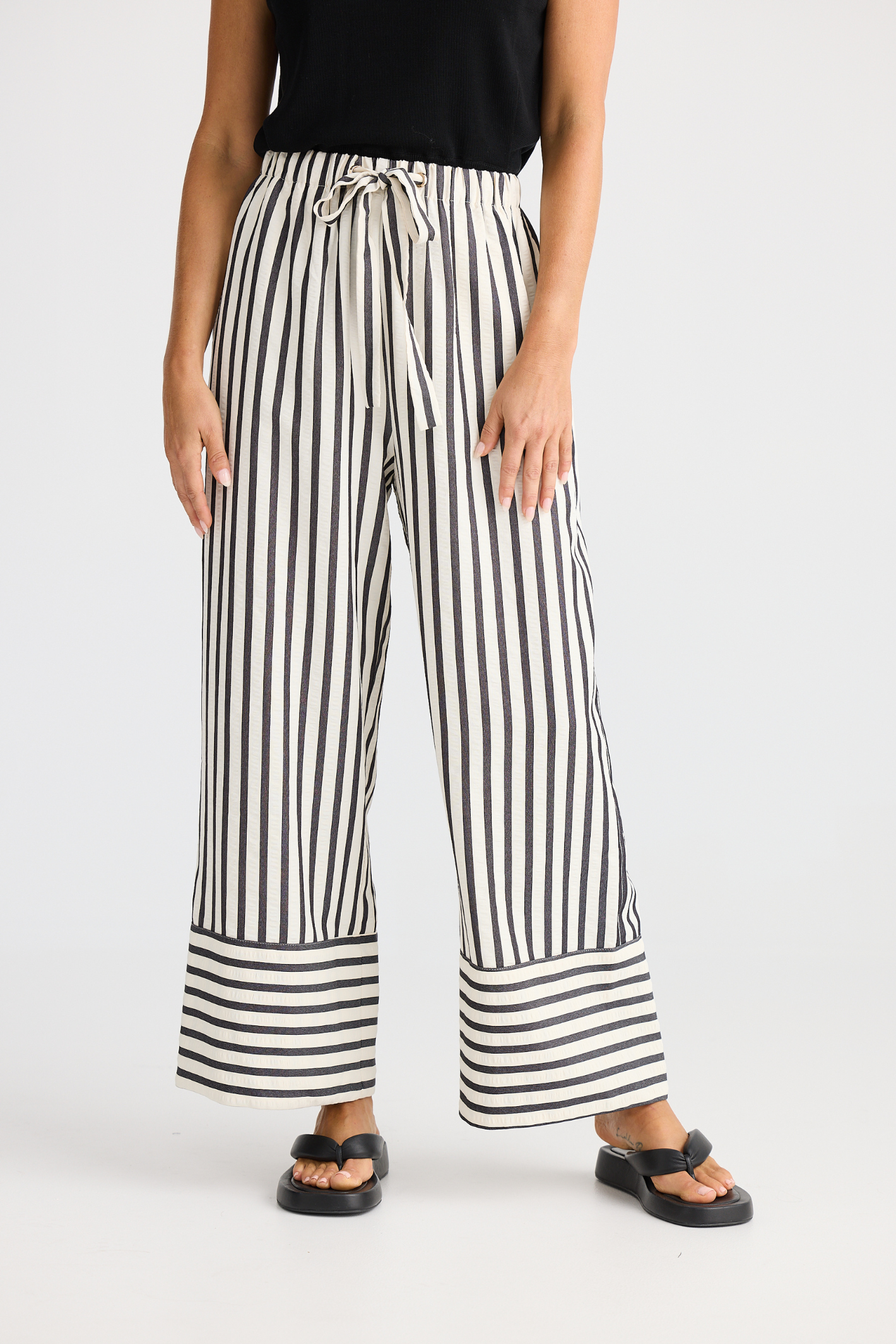 Brave + True Portia Pant in black stripe. Wide-leg trousers with elasticated waist, drawstring and side pockets. Shop at Dotique.