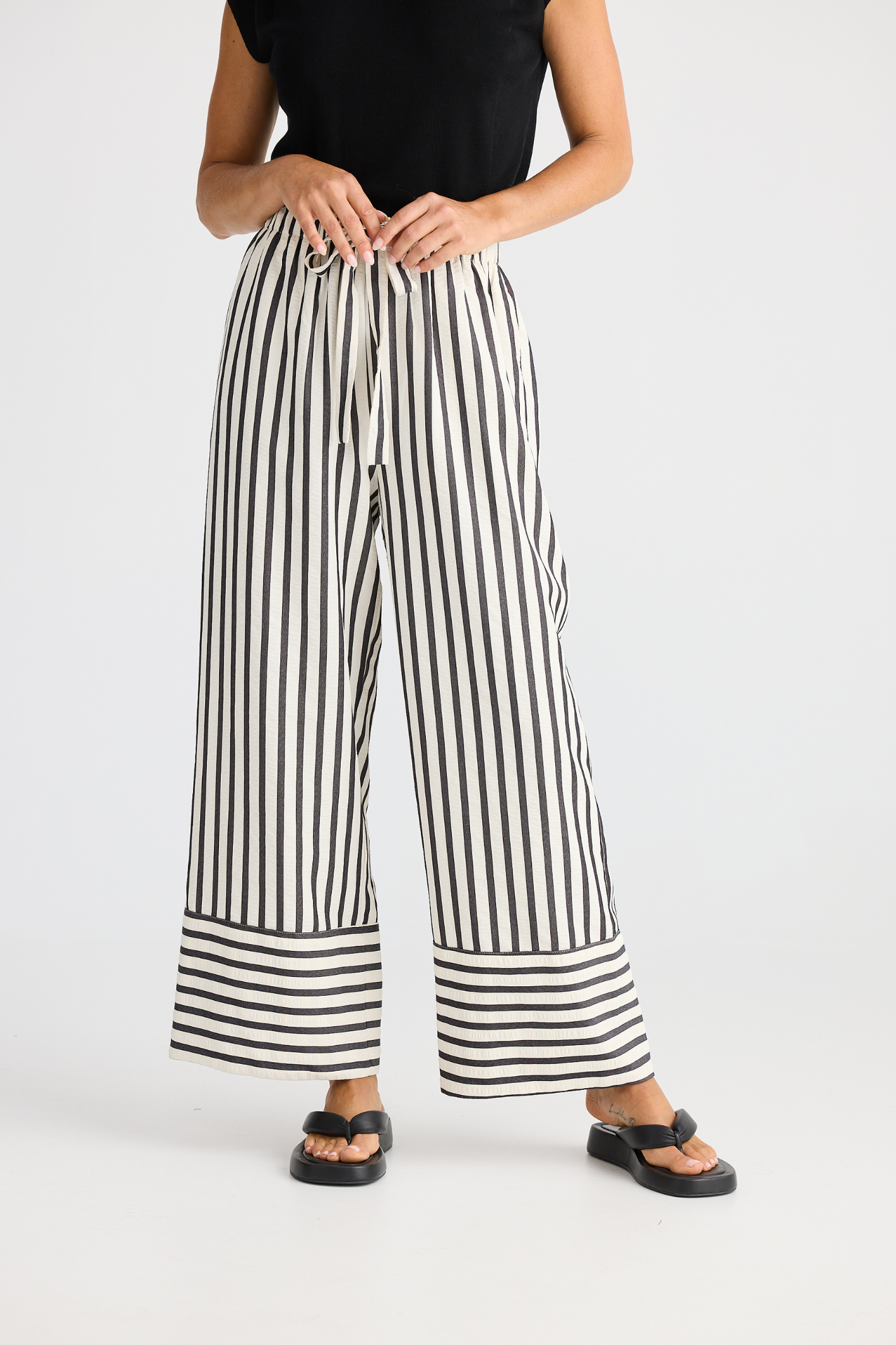 Brave + True Portia Pant in black stripe. Wide-leg trousers with elasticated waist, drawstring and side pockets. Shop at Dotique.