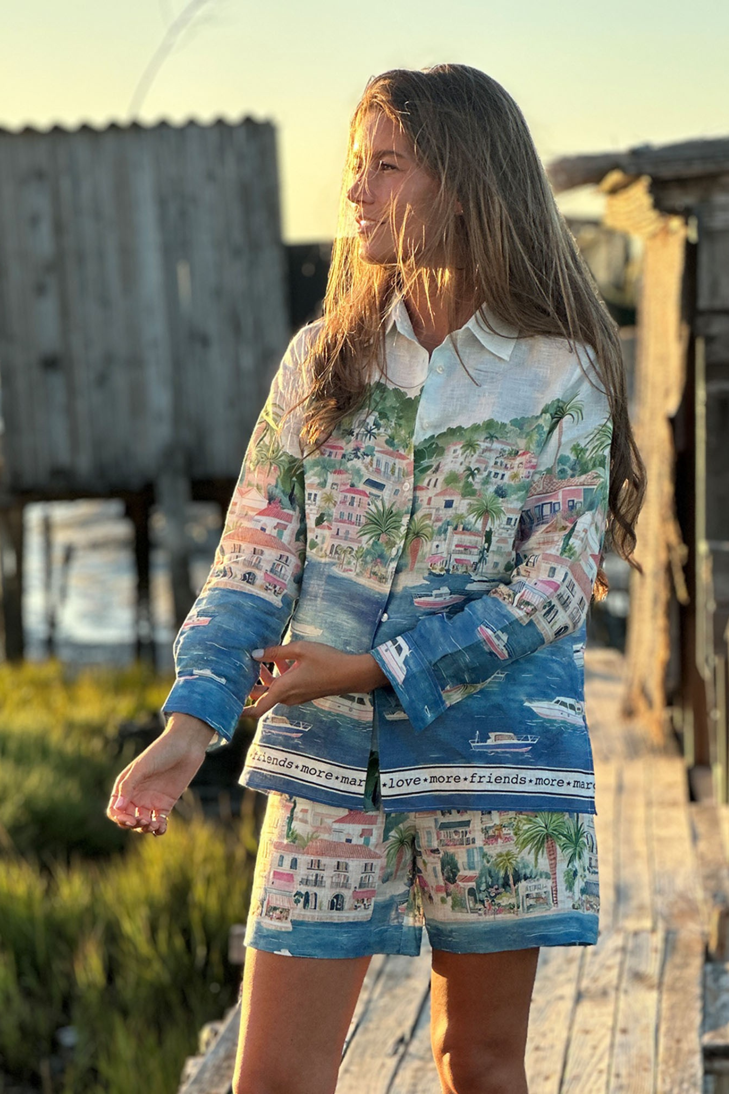Woman wearing Vilagallo 33566 Coastal City Print Linen Shirt by vilagallo shop vilagallo at Dotique styled outdoors in sunlight