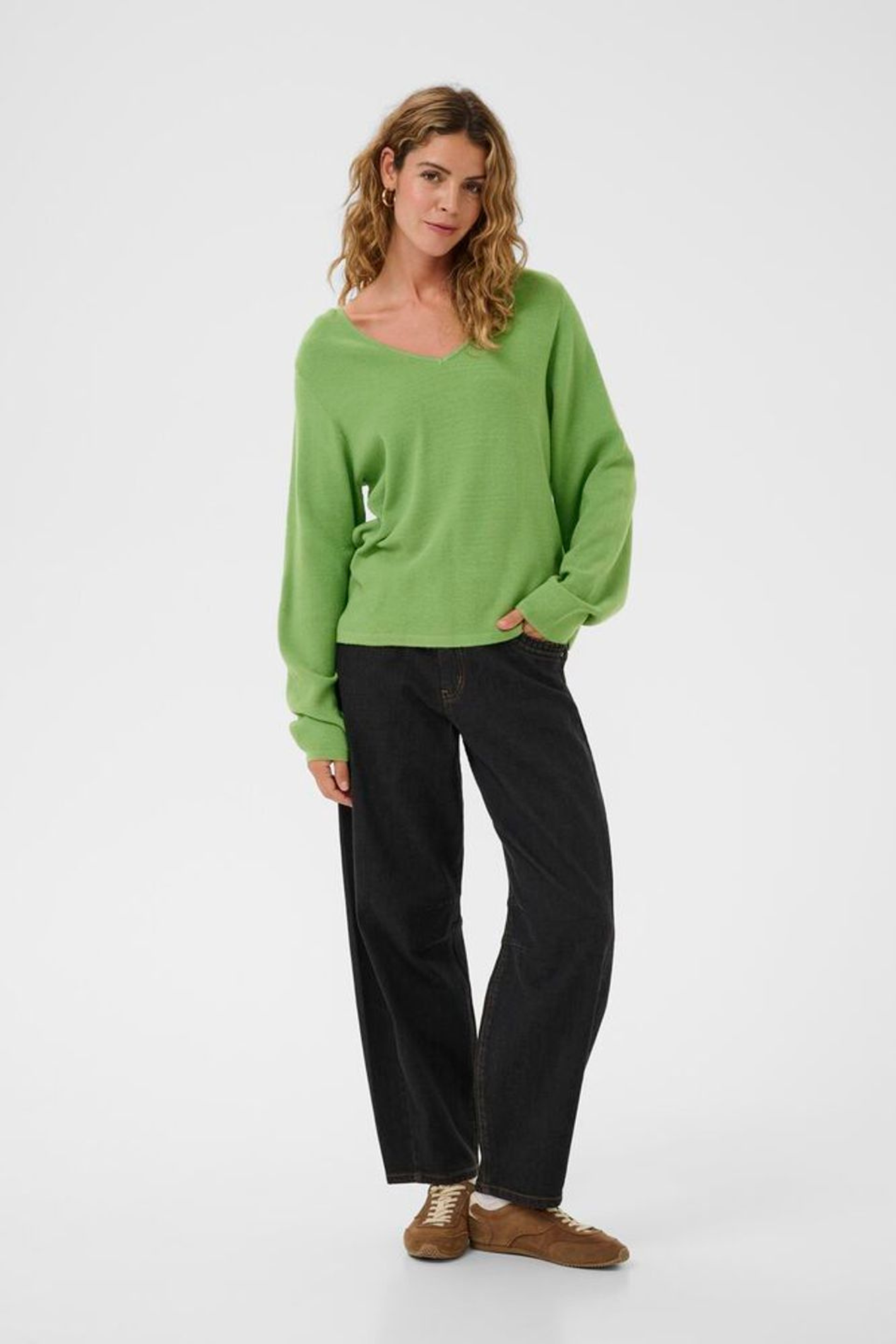 Cream CRDela Knit Blouse in jade green. A relaxed fit knitted top with a soft V-neck and long sleeves. Easy everyday style from Dotique.
