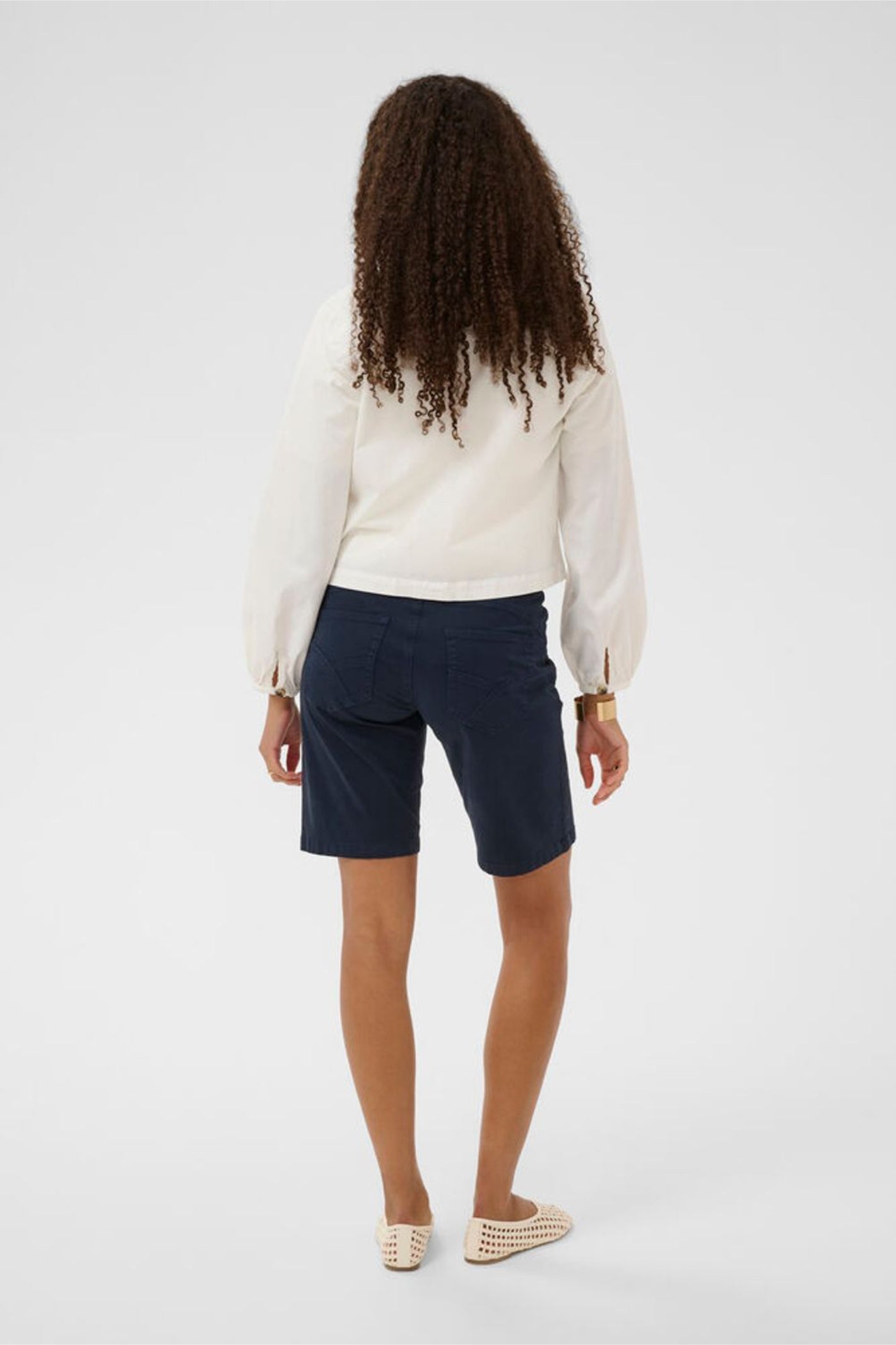 Back view of a woman wearing Cream 10614741 CRBerta Twill Jacket Snow White by Cream, shop Cream at Dotique.