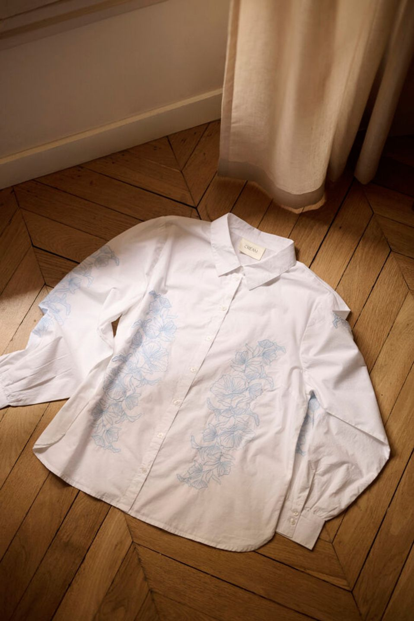 White cotton embroidered shirt by Cream. Light, breathable and easy to wear with jeans or tailoring. Shop now at Dotique.