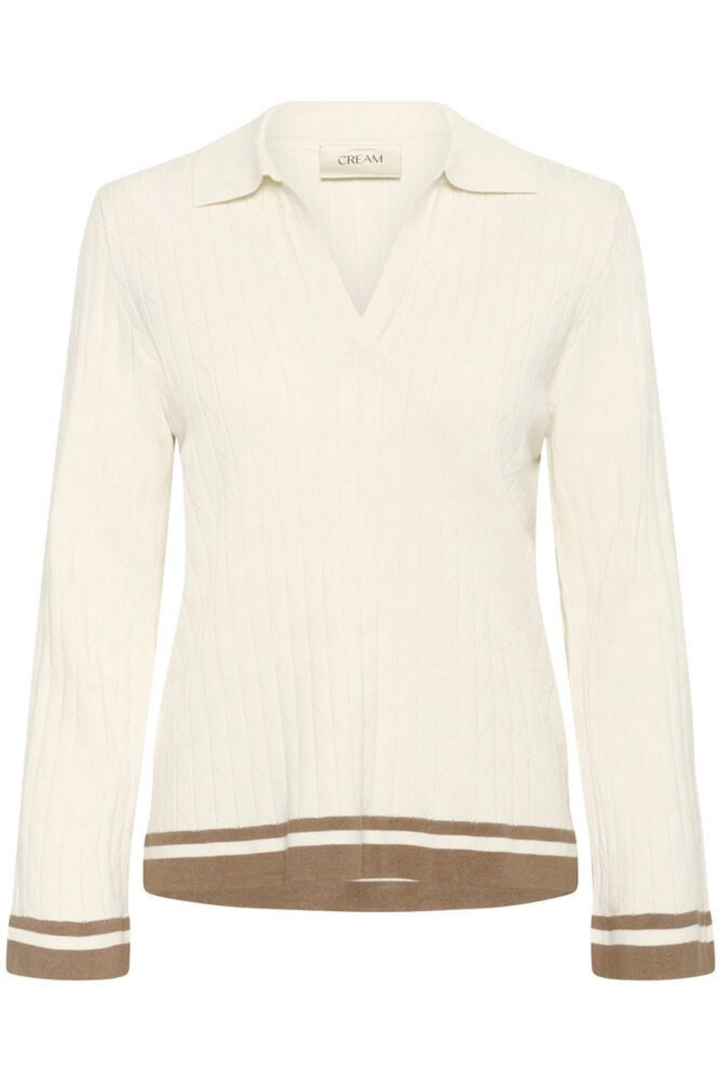 Soft ribbed polo knit in whisper white by Cream. Flattering fit with subtle contrast trim. Easy, polished everyday style. Shop at Dotique.