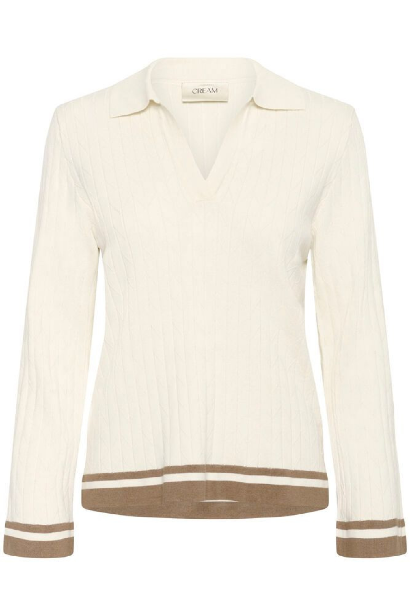 Soft ribbed polo knit in whisper white by Cream. Flattering fit with subtle contrast trim. Easy, polished everyday style. Shop at Dotique.