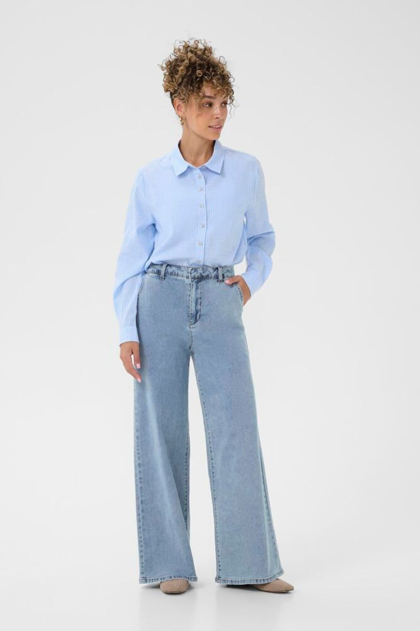 Light blue wide leg jeans by Cream with a high waist and soft stretch. Easy to wear and flattering for everyday style. Shop now at Dotique.