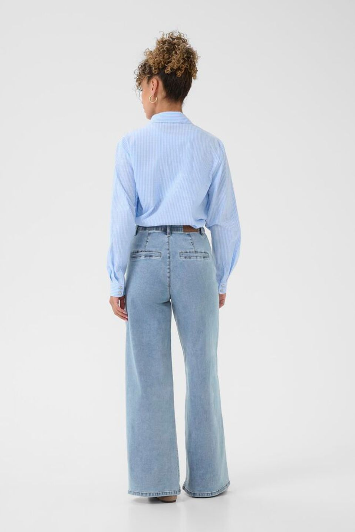 Light blue wide leg jeans by Cream with a high waist and soft stretch. Easy to wear and flattering for everyday style. Shop now at Dotique.
