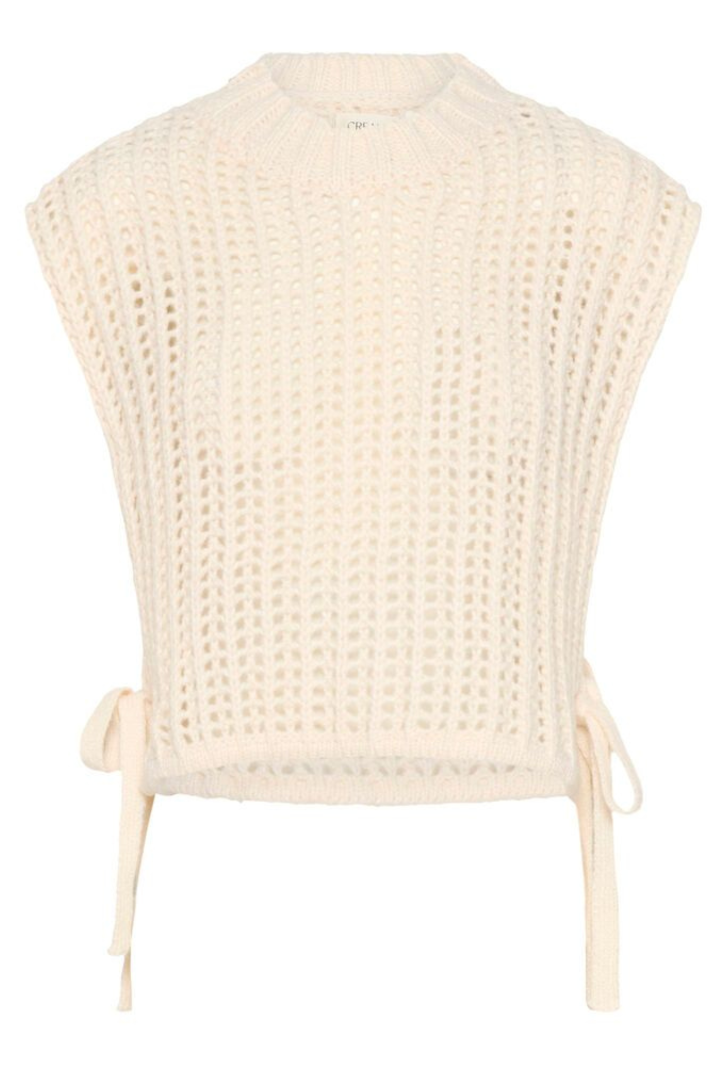 Lightweight open knit slipover in whisper white by Cream. Easy to layer with shirts or dresses for relaxed everyday style. Shop at Dotique.
