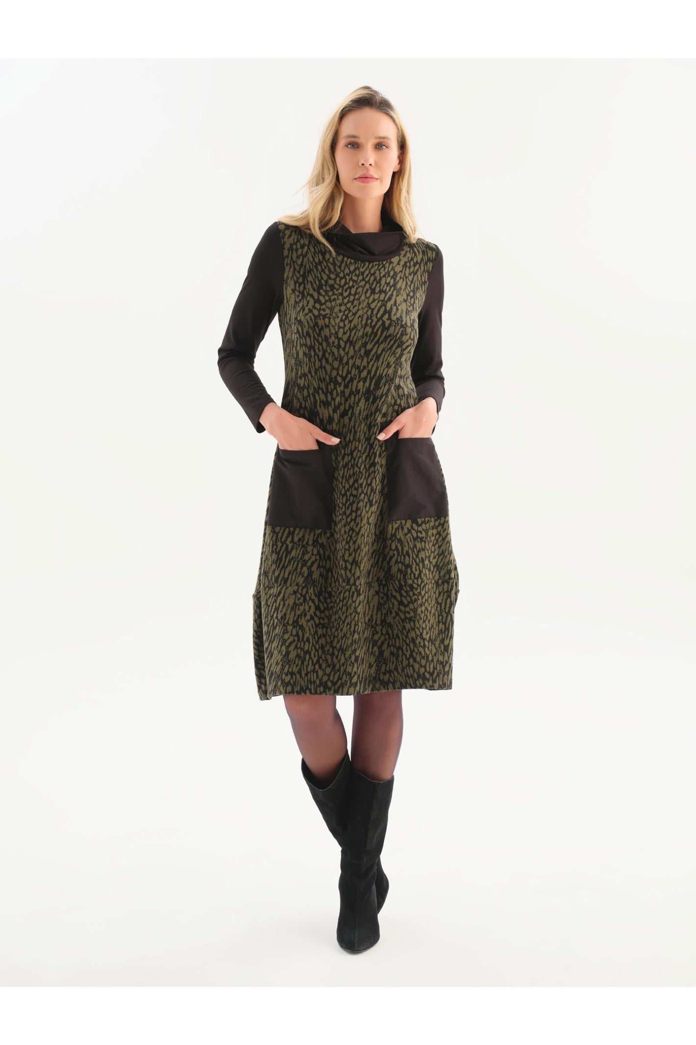 Dotique Dolcezza 76114 assorted abstract print knit dress with a roll neckline, contrast black sleeves and front patch pockets.
