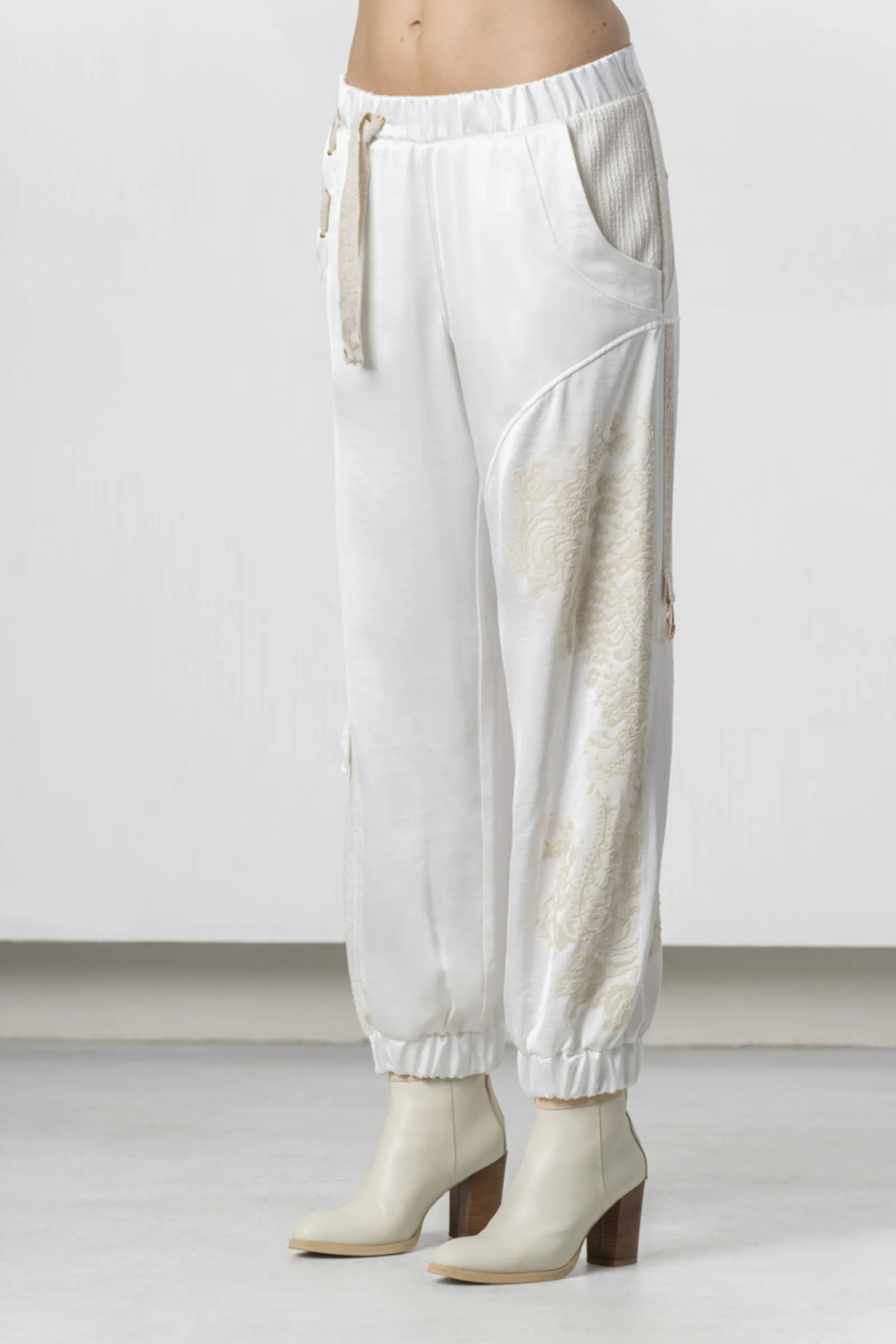 Model wearing Elisa Cavaletti White Jogger Trousers Jacquard Insert Cotton Blend EJP266003701 03149 by Elisa Cavaletti shop Dotique