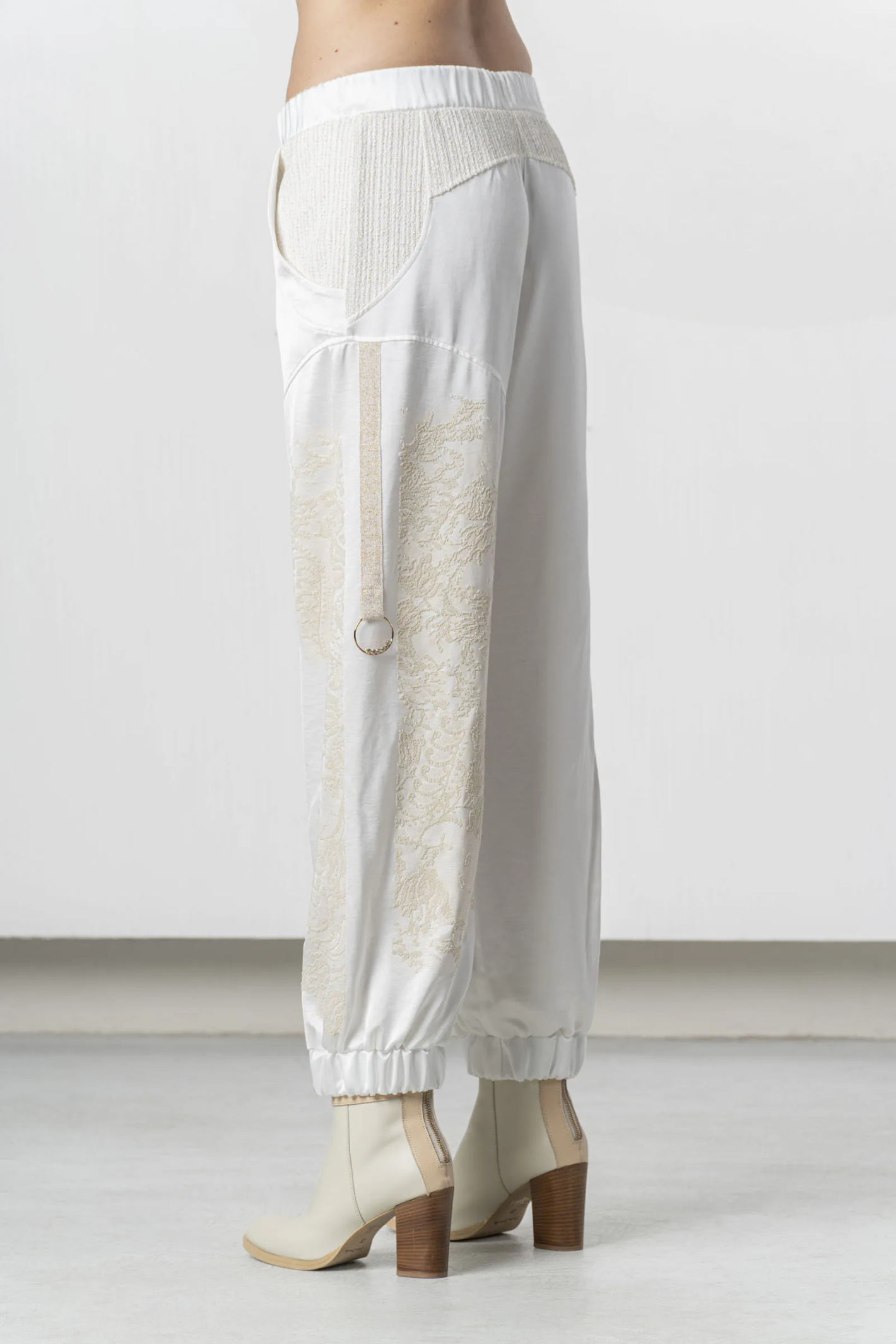 Model wearing Elisa Cavaletti White Jogger Trousers Jacquard Insert Cotton Blend EJP266003701 03149 by Elisa Cavaletti shop Dotique