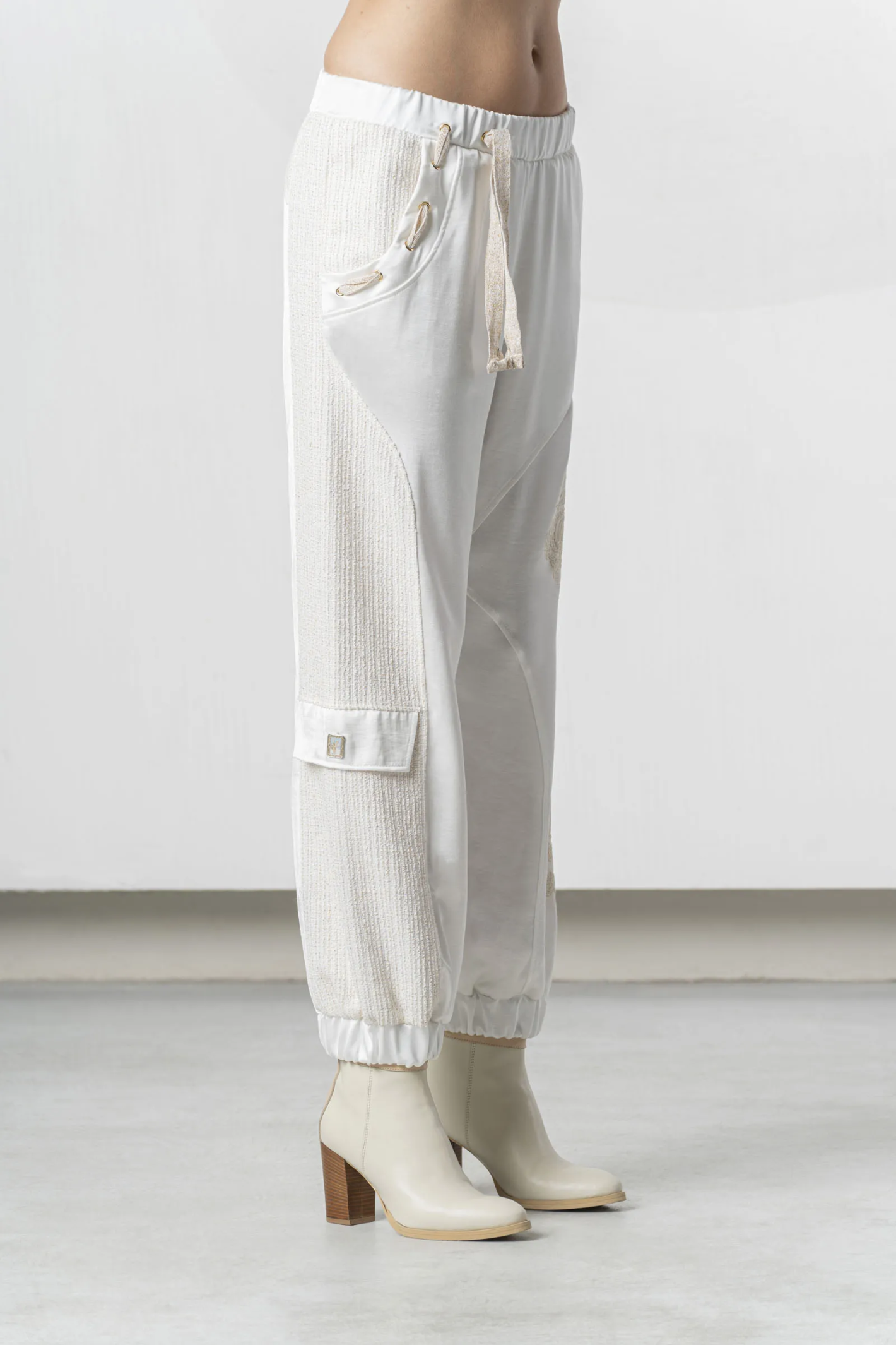 Model wearing Elisa Cavaletti White Jogger Trousers Jacquard Insert Cotton Blend EJP266003701 03149 by Elisa Cavaletti shop Dotique